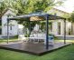 Martinique 10'x14' Garden gazebo grey aluminum with polycarbonate roof panels on a deck patio with garden furniture