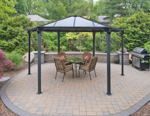 Hexagon gazebo 13' x 15' on garden patio with dining furniture