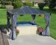 12'x12' hot tub aluminum gazebo with polycarbonate roof panels and privacy curtains to cover a hot tub on a concrete patio