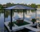 Palermo 12'x12' Aluminium gazebo with polycarbonate roof panels on patio deck above lake