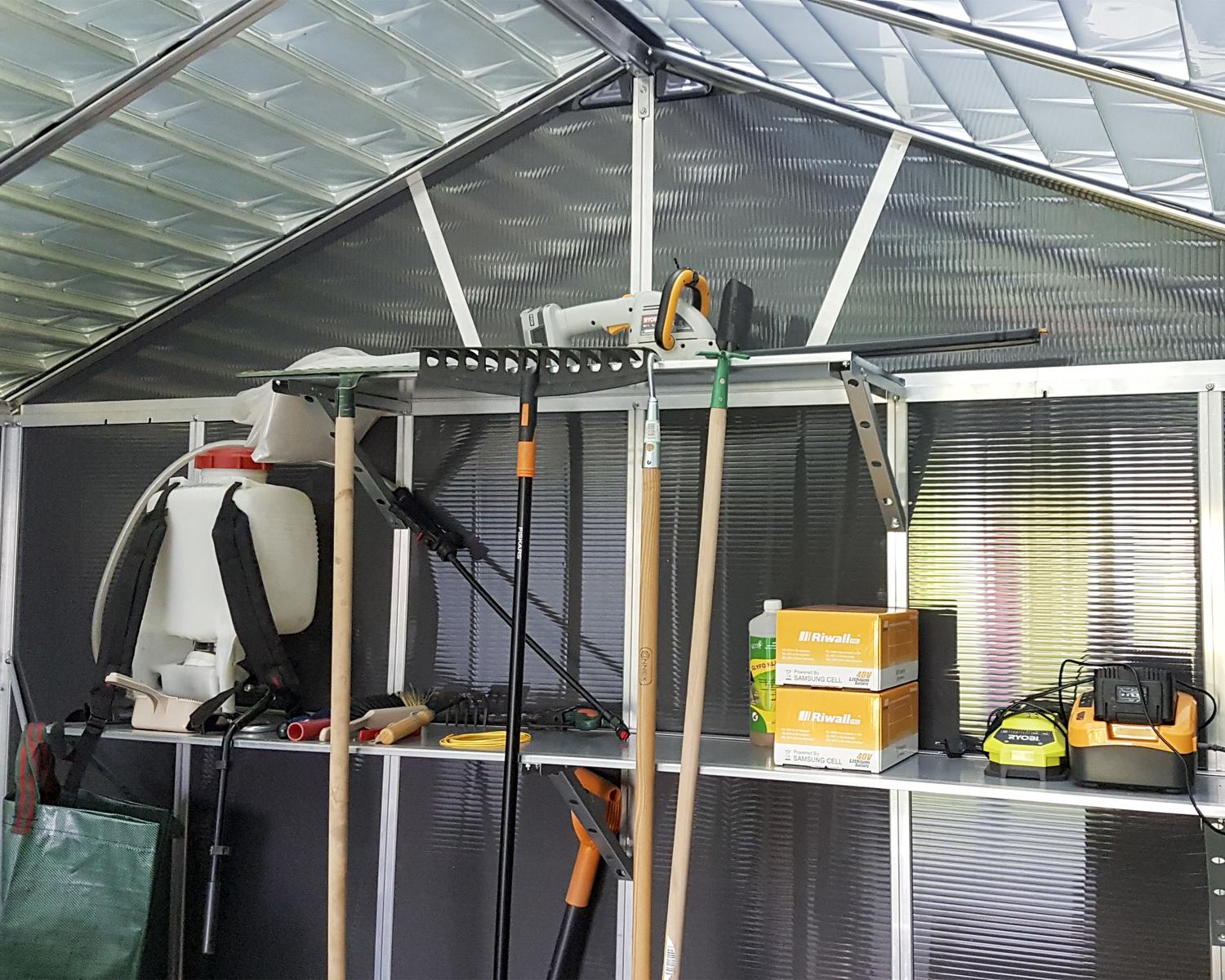 organizing of tools in a large storage shed with a skylight roof