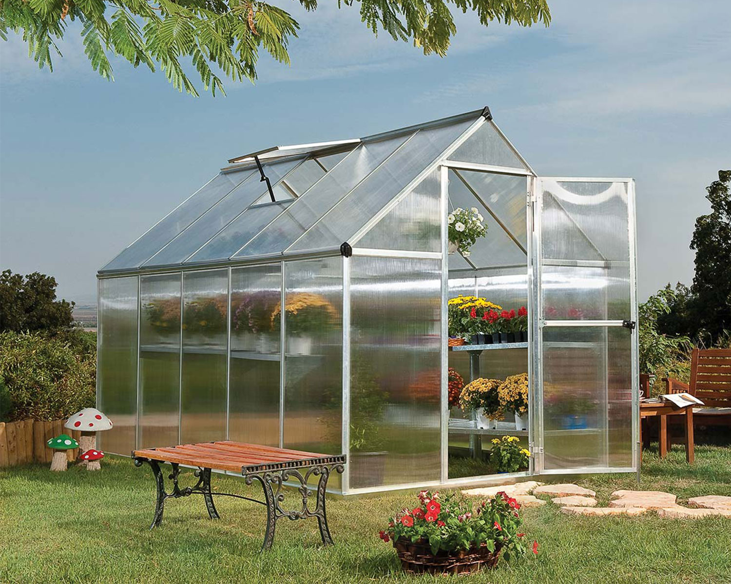 Greenhouse Mythos 6' x 10' Silver Structure & Twinwall Panels on beckyard lawn
