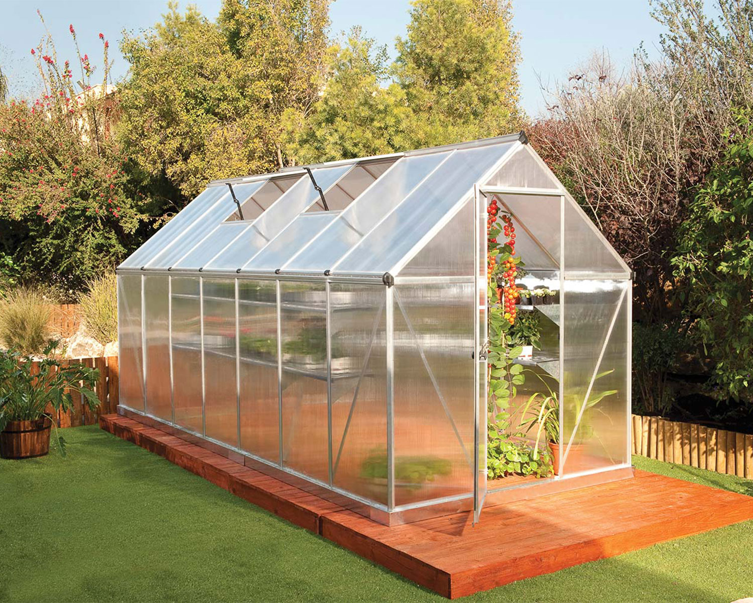 Greenhouse Mythos 6 ft. x 14 ft. Kit - Silver Structure & Twinwall Panels outside on a lawn