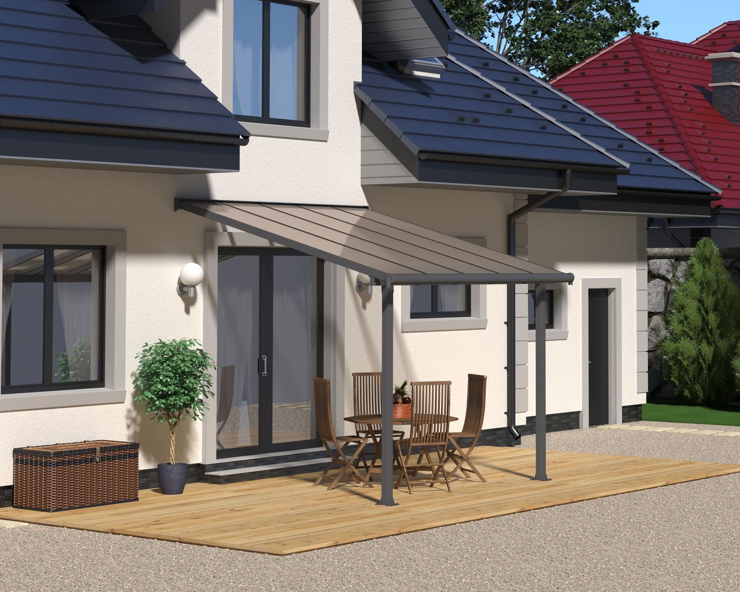 Grey Aluminium Patio Cover With Bronze-tinted twin-wall polycarbonate roof panels on Deck Patio protect garden furniture