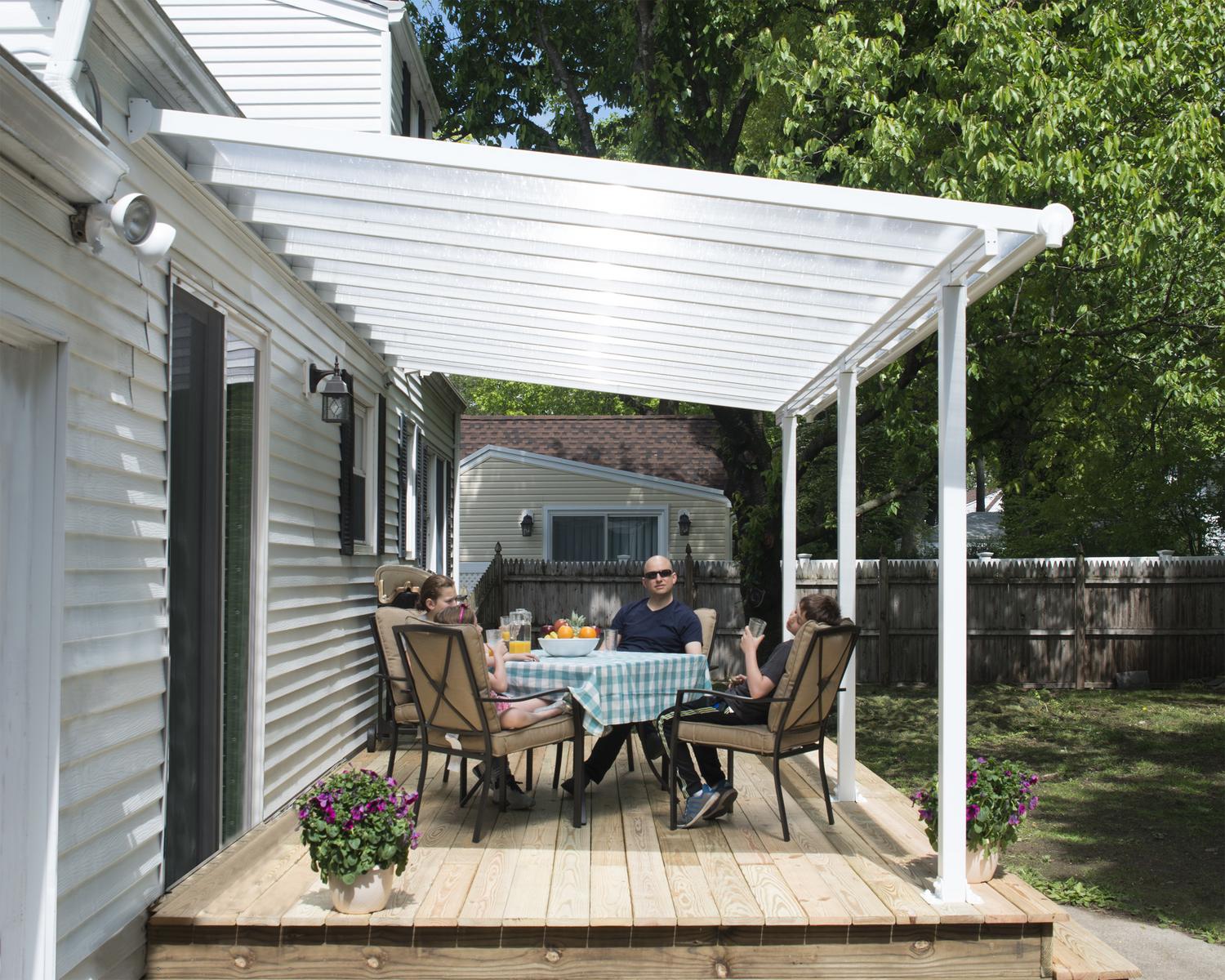 White Aluminium Patio Cover With Clear twin-wall polycarbonate roof panels on Deck Patio protect garden furniture