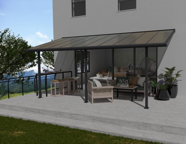 Grey Aluminium Patio Cover with Bronze-tinted twin-wall polycarbonate roof panels protect garden furniture