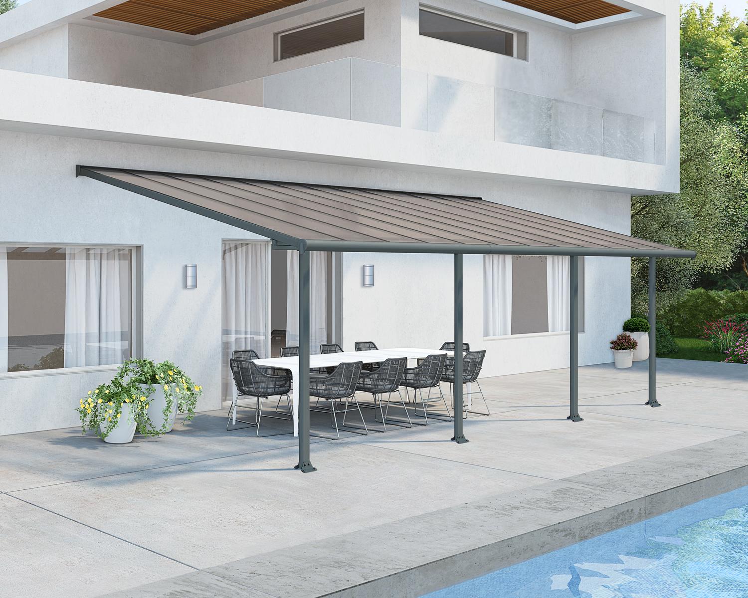 Grey Aluminium Patio Cover With Bronze-tinted twin-wall polycarbonate roof panels on Beside Pool Patio protect garden furniture
